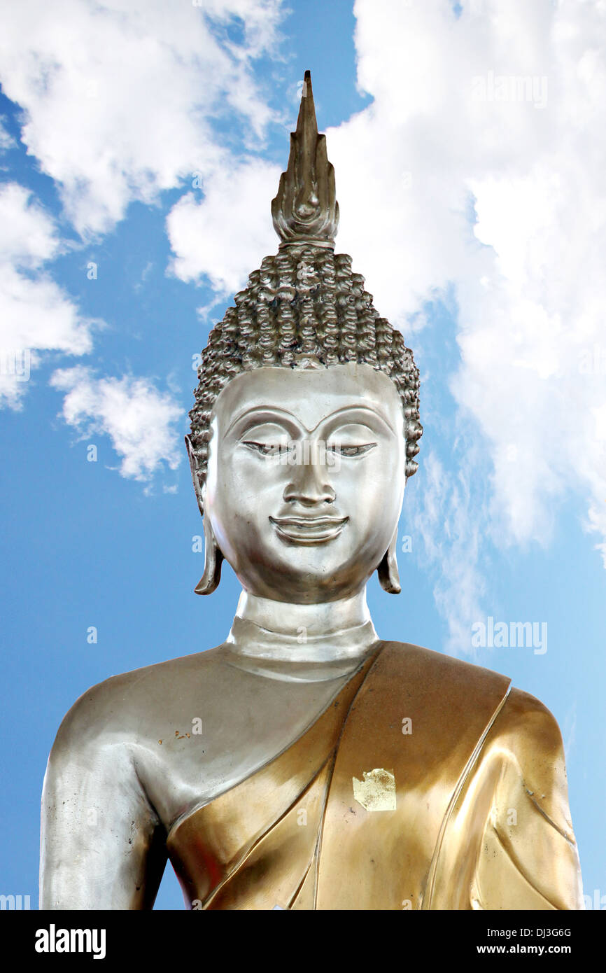Picture Buddha statue in the background is blue sky. Stock Photo