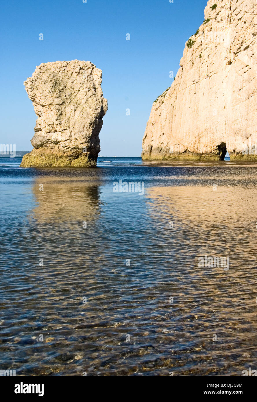 Chalk sea stack and opening in the chalk cliff face of Bats Head, on Dorset's Jurassic coastline. Stock Photo