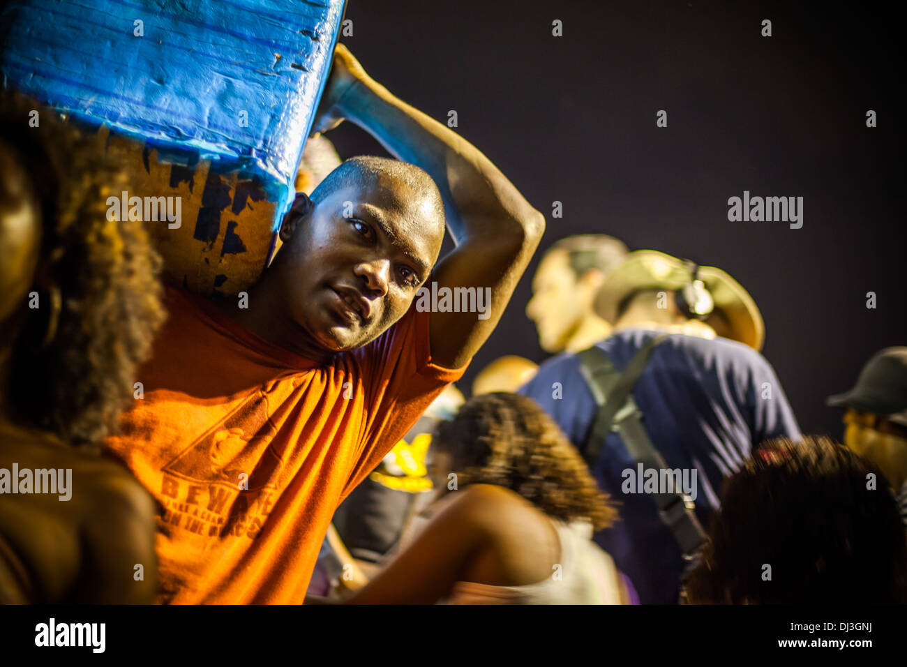 A drinks seller in the crowds at the 2010 Carnival in Rio de Janeiro, Brazil Stock Photo