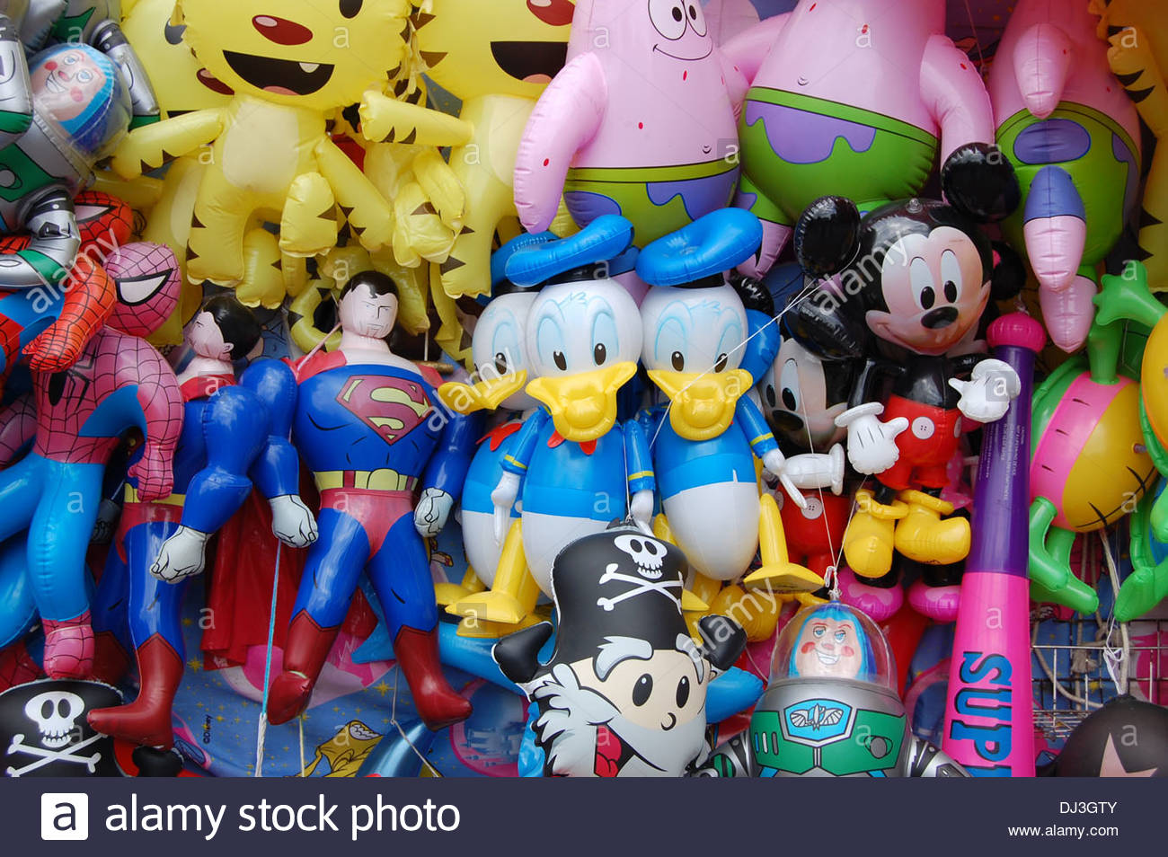 Donald Duck Mickey Mouse Superman metaphors inflatable toys balloons