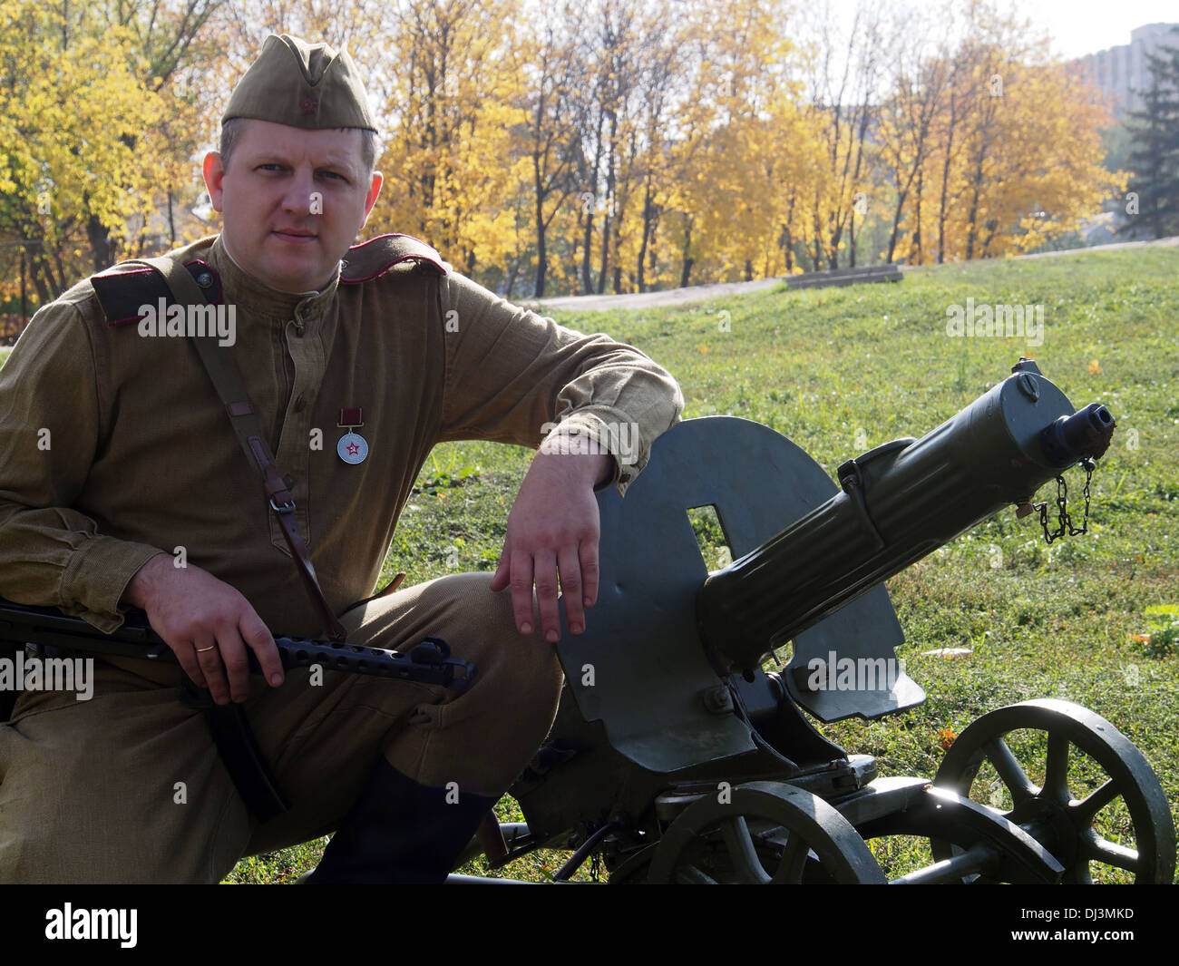 Redator Machine Gun re-enactor in the form of a Red Army soldier with a machine gun Maxim ...