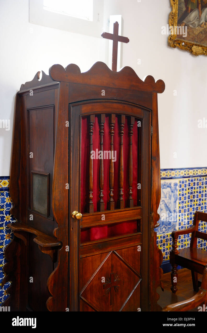 confessional booth box in a roman catholic church Stock Photo