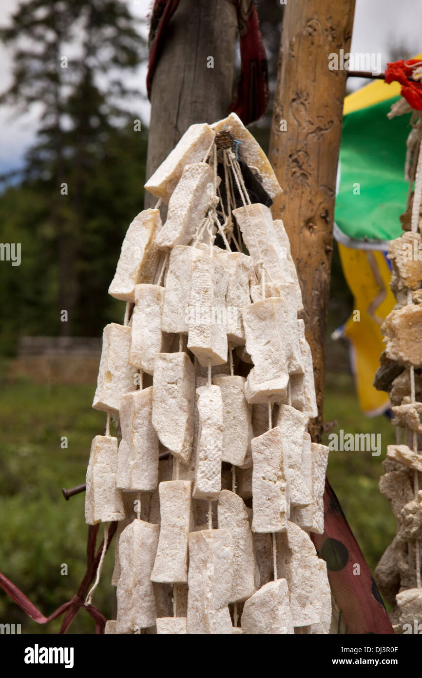 Bhutan, food, dried yak cheese hung on string for sale on road to Dochu La pass Stock Photo