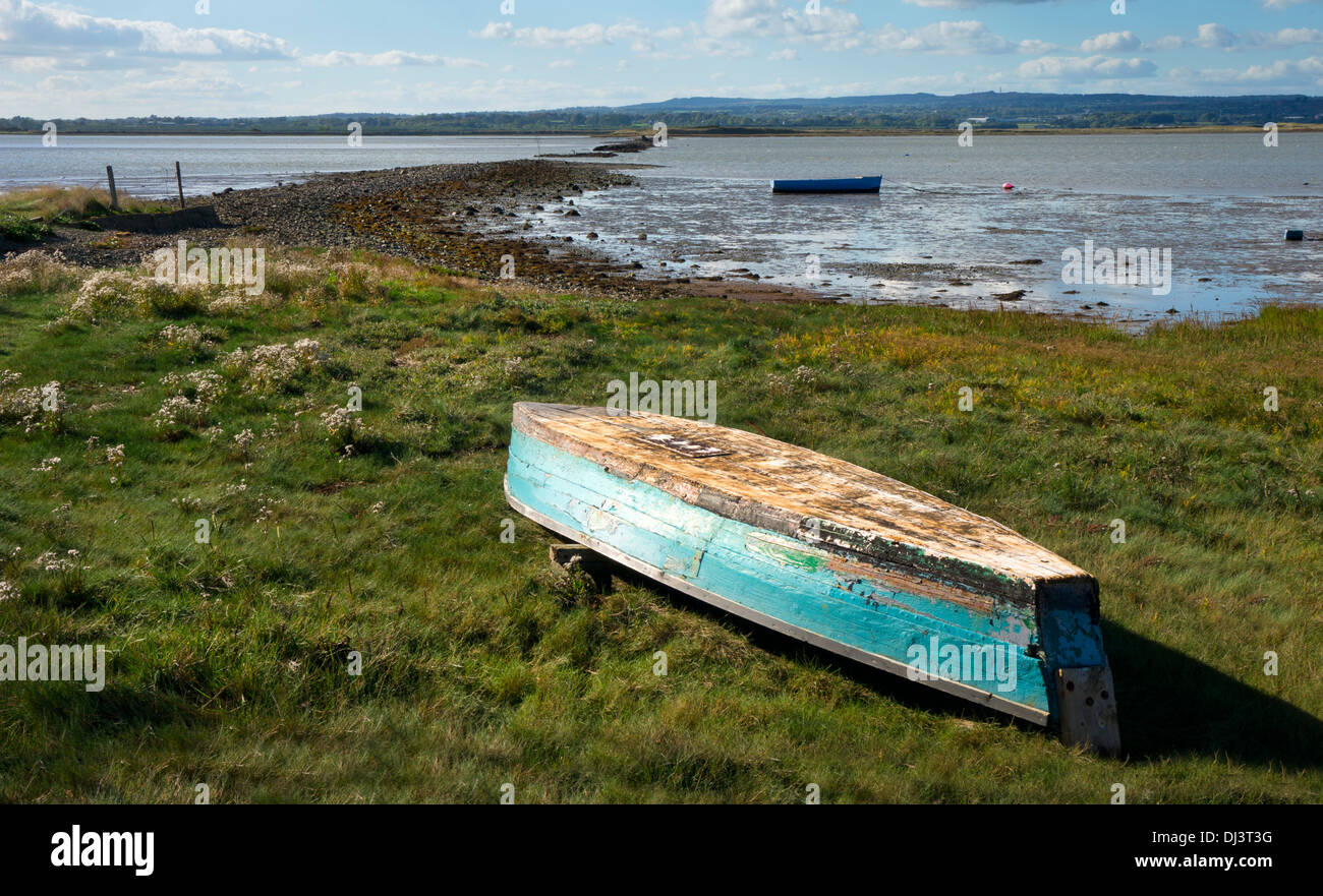Old wooden rowing boat and estuary at Wexford, County Wexford, Ireland Stock Photo