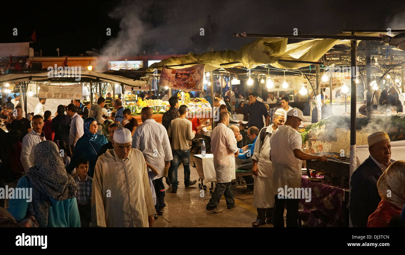 Open air restaurants at the Djemaa El Fna market at night, Medina, Marrakech, Morocco, North Africa Stock Photo