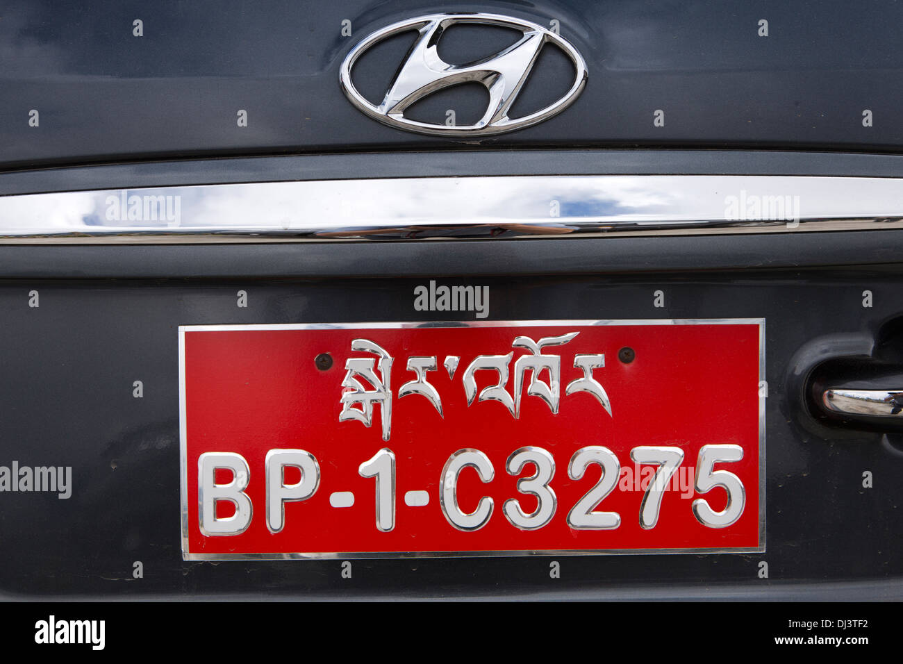 Bhutan, driving, Bhutanese registration number plate on Hyundai vehicle Stock Photo