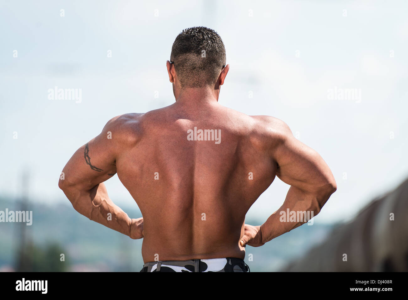 Man Showing Off His Back Stock Photo - Alamy