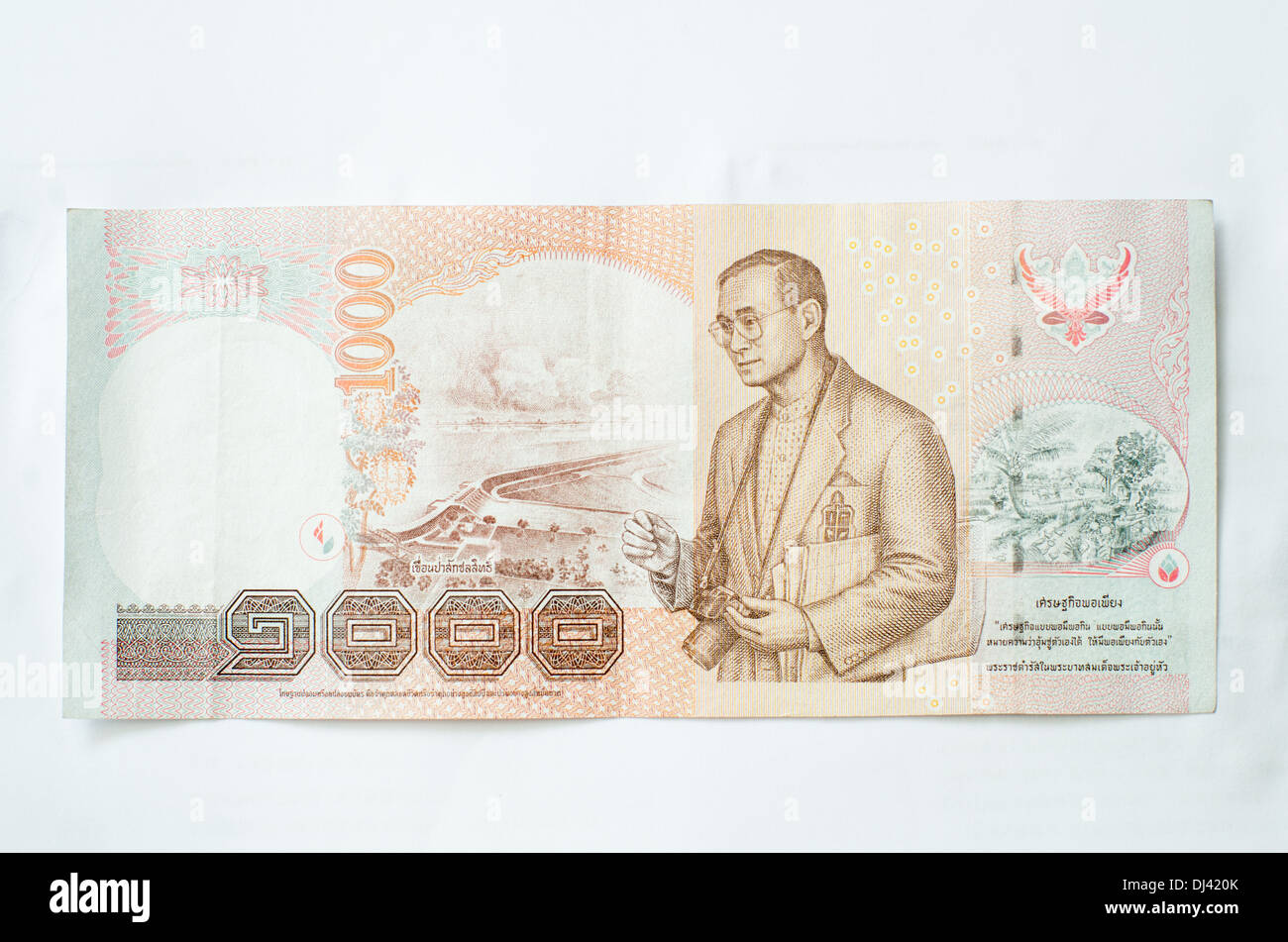 Close up of thailand currency, thai baht with the images of Thailand King. Denomination of 1000 bahts. Stock Photo