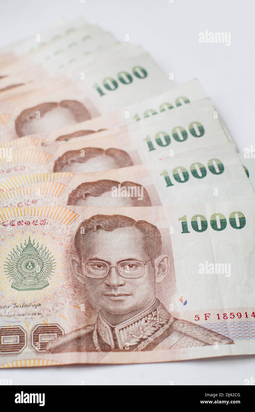 Close up of thailand currency, thai baht with the images of Thailand King. Denomination of 1000 bahts. Stock Photo