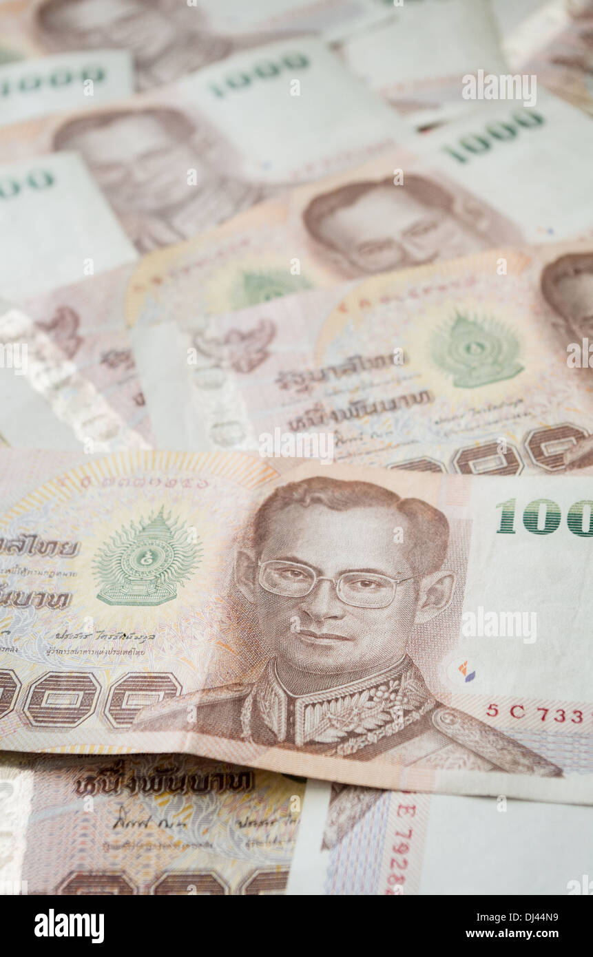 Close up of thailand currency, thai baht with the images of Thailand King. Denomination of 1000 bahts. Stock Photo