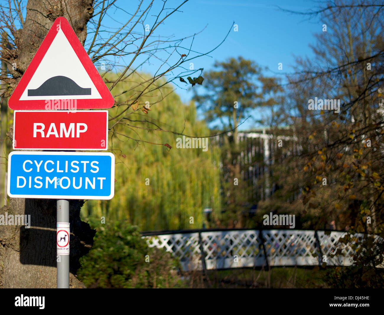 Ramp, Cyclists Dismount and Clean it Up signs at Millmead, Guildford ...