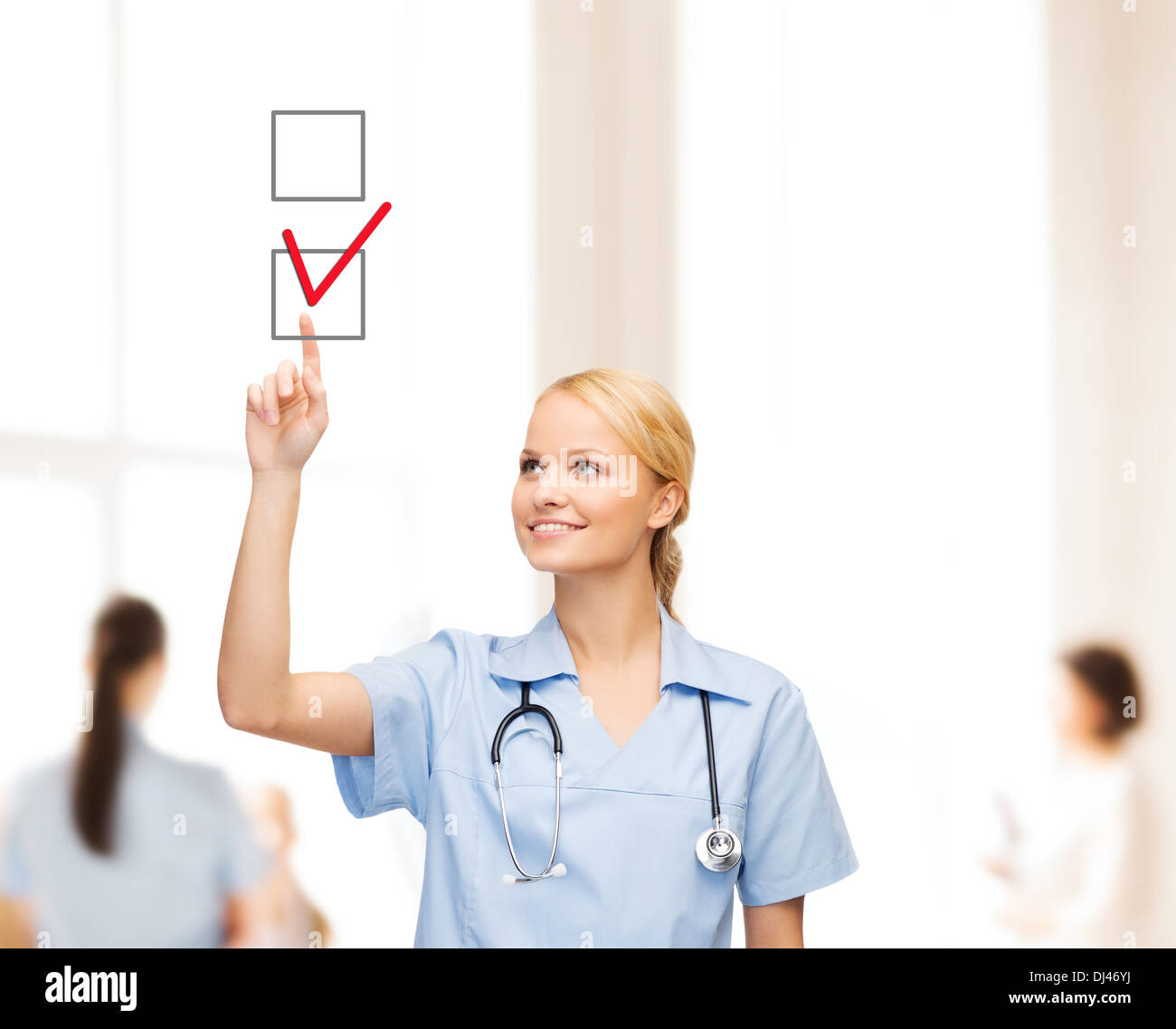 doctor or nurse drawning checkmark into checkbox Stock Photo - Alamy