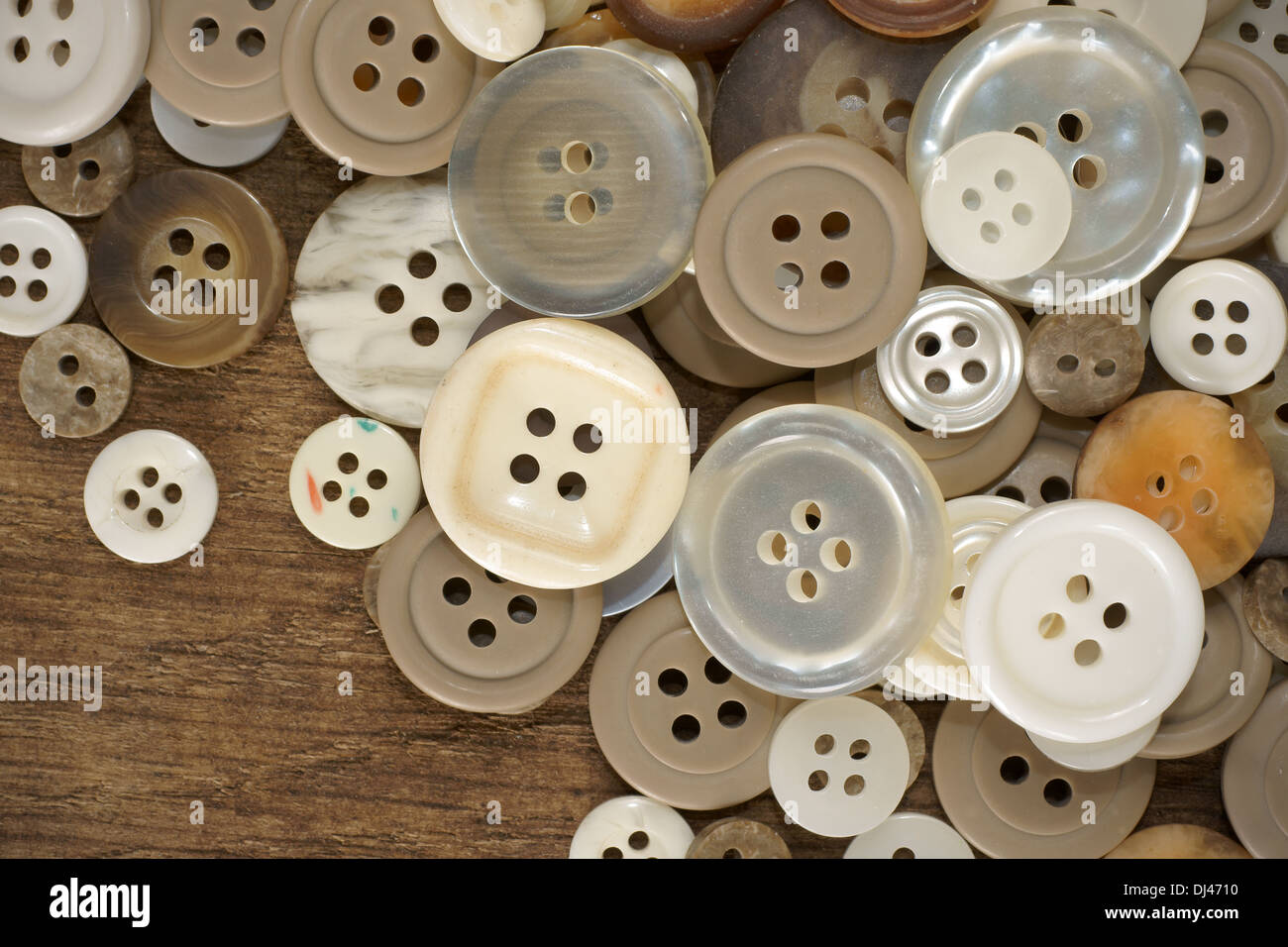 Stack of old fashioned brown beige and white buttons Stock Photo - Alamy