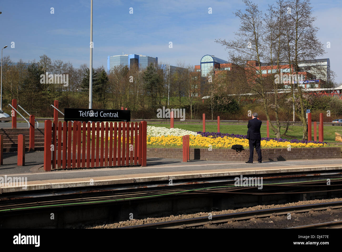Telford station platform with the town centre high rise office