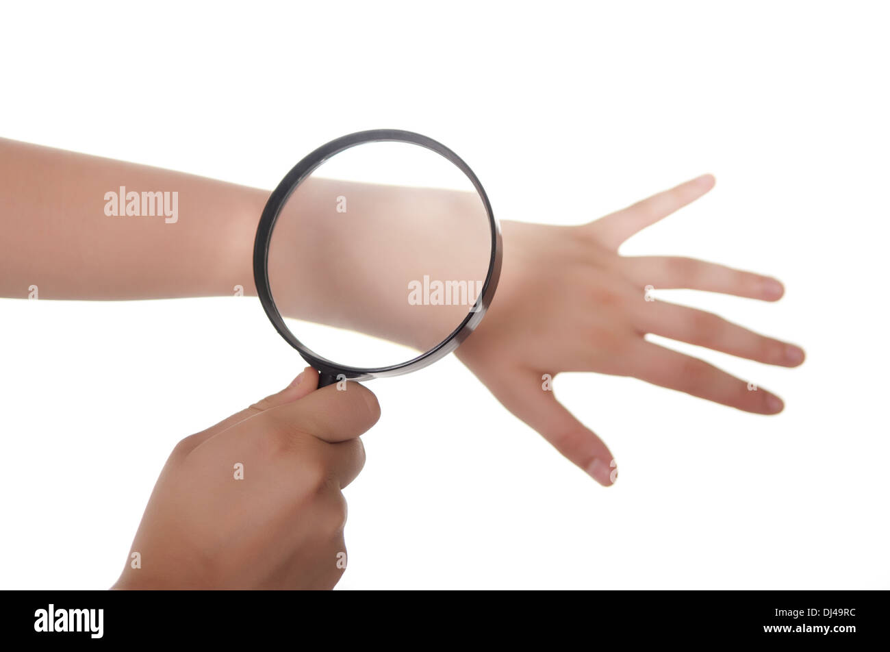 hand, magnifying glass and skin Stock Photo