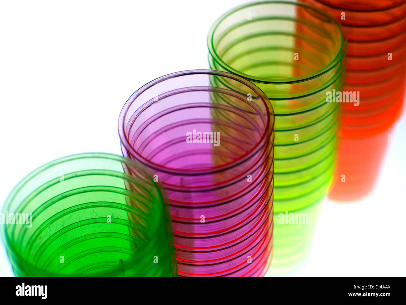 Coloured plastic shot glasses, London Stock Photo Alamy