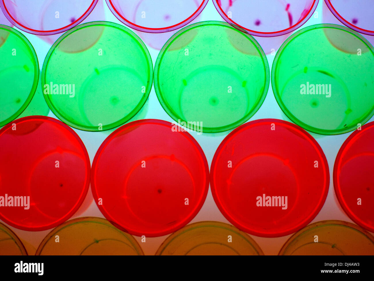 Coloured plastic shot glasses, London Stock Photo Alamy
