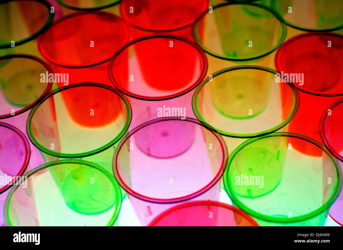 Coloured plastic shot glasses, London Stock Photo Alamy