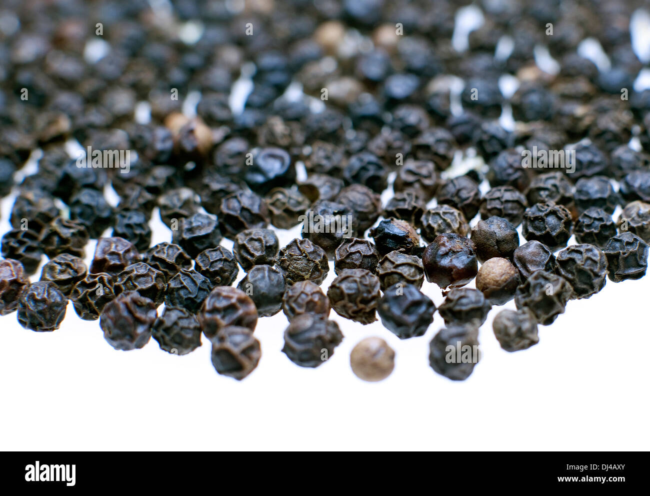 Whole black peppercorns, London Stock Photo Alamy