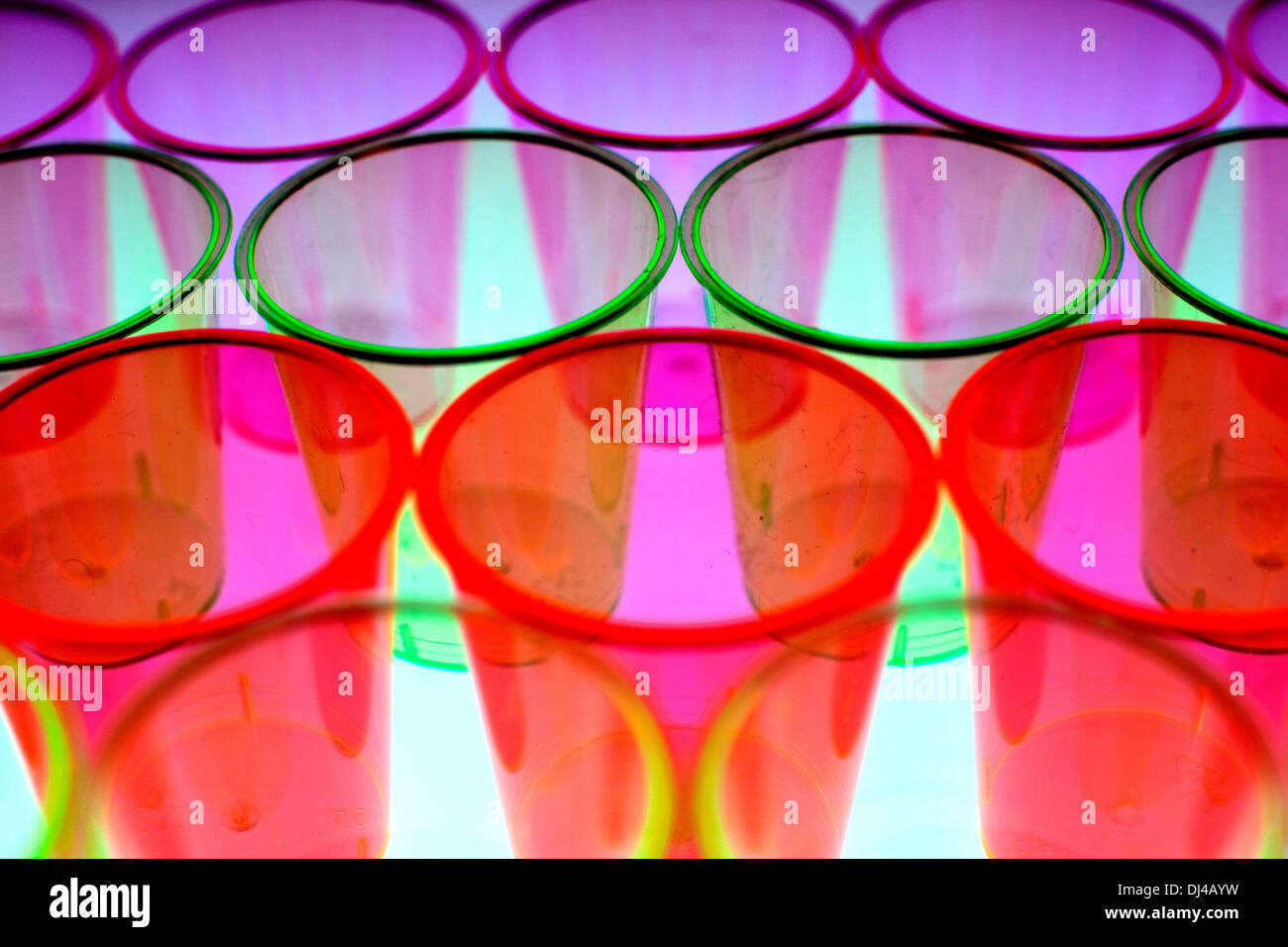 Coloured plastic shot glasses, London Stock Photo Alamy