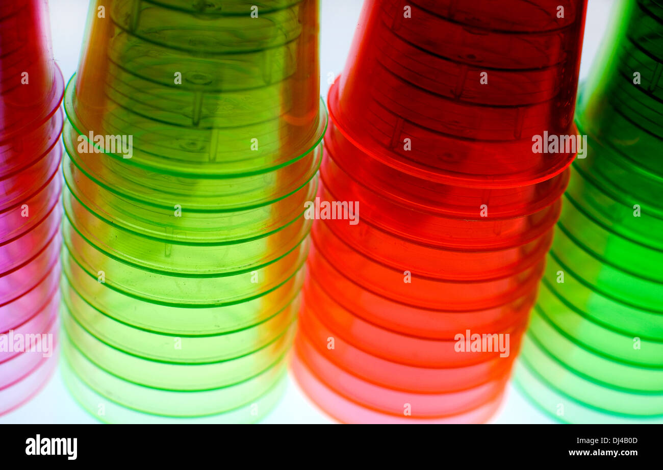 Coloured plastic shot glasses, London Stock Photo Alamy