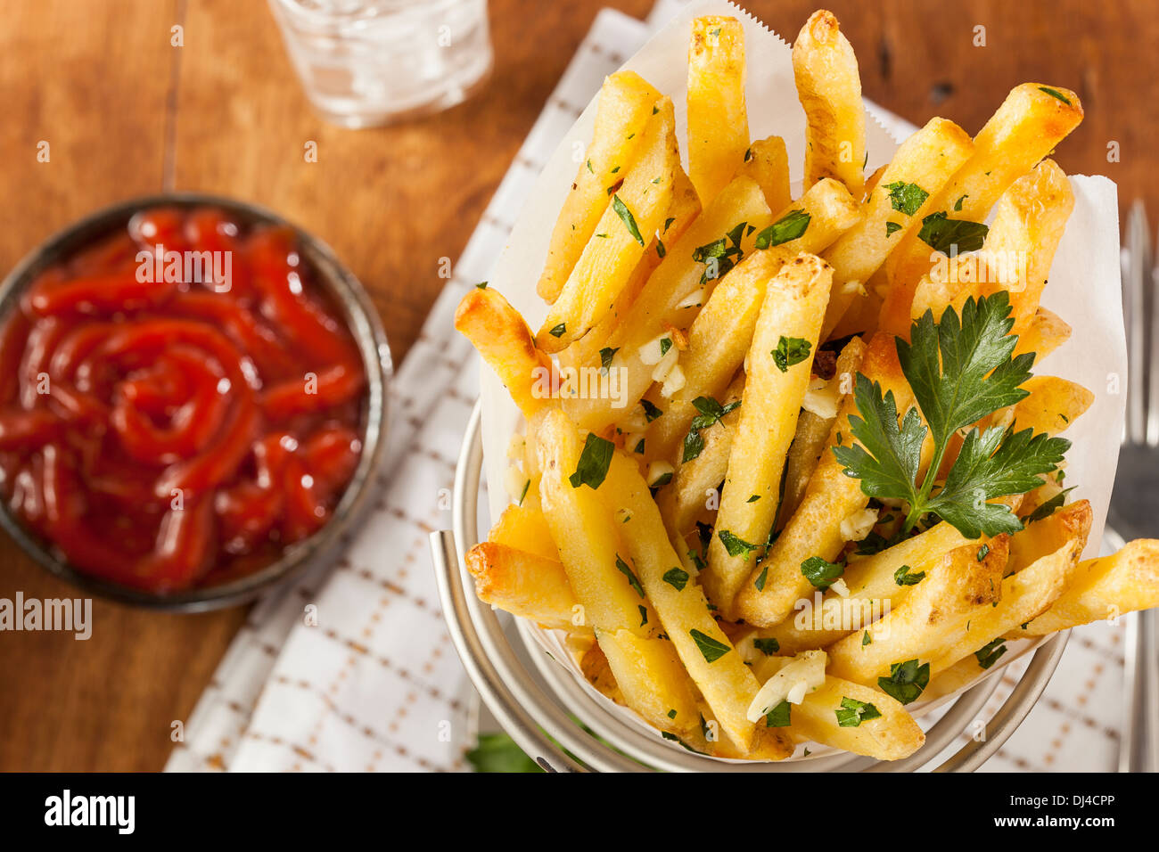 Garlic and Parsley French Fries with Ketchup Stock Photo Alamy