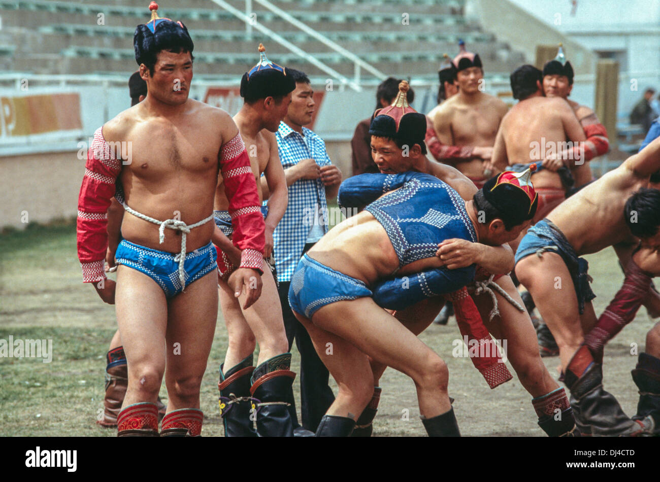Mongolian wrestlers training in Ulan Bator stadium Stock Photo