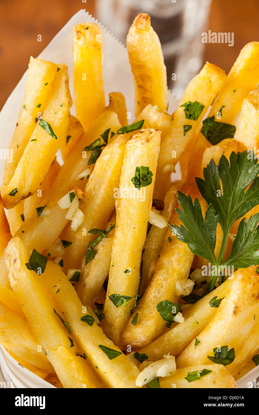 Garlic and Parsley French Fries with Ketchup Stock Photo