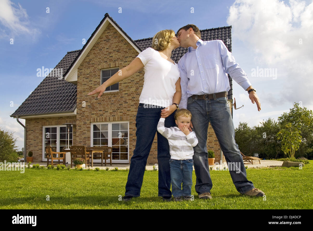 young family from their home Stock Photo