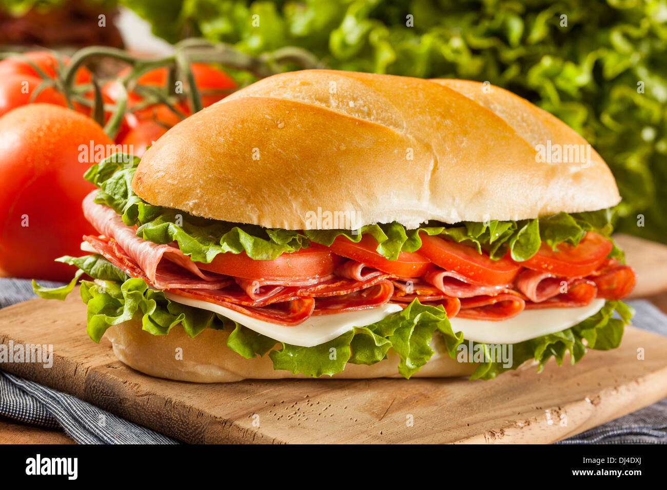 Homemade Italian Sub Sandwich with Salami, Tomato, and Lettuce Stock