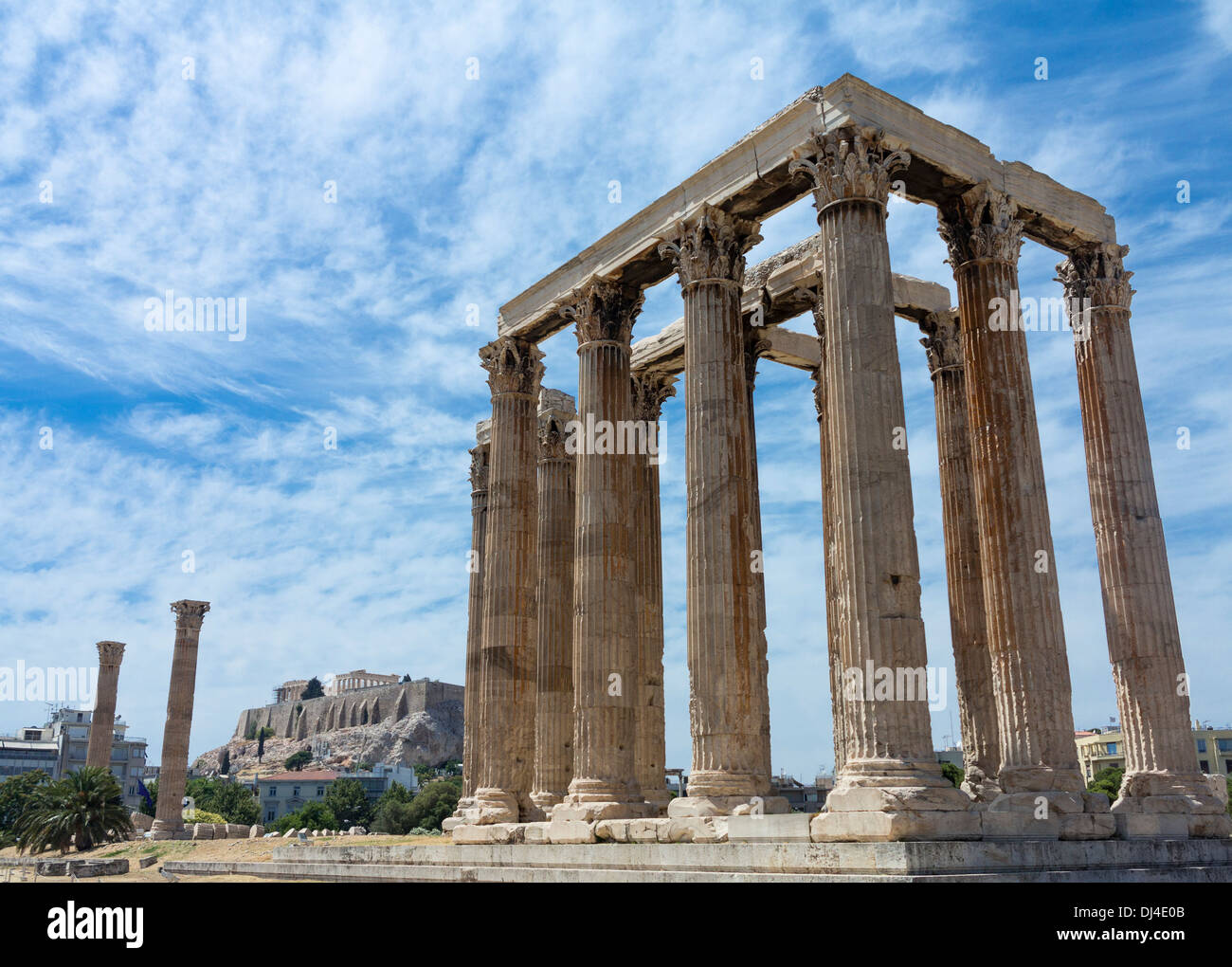 Ancient Greece - The Temple of Olympian Zeus / Olympieion, Athens, Greece - with the Acropolis behind Stock Photo