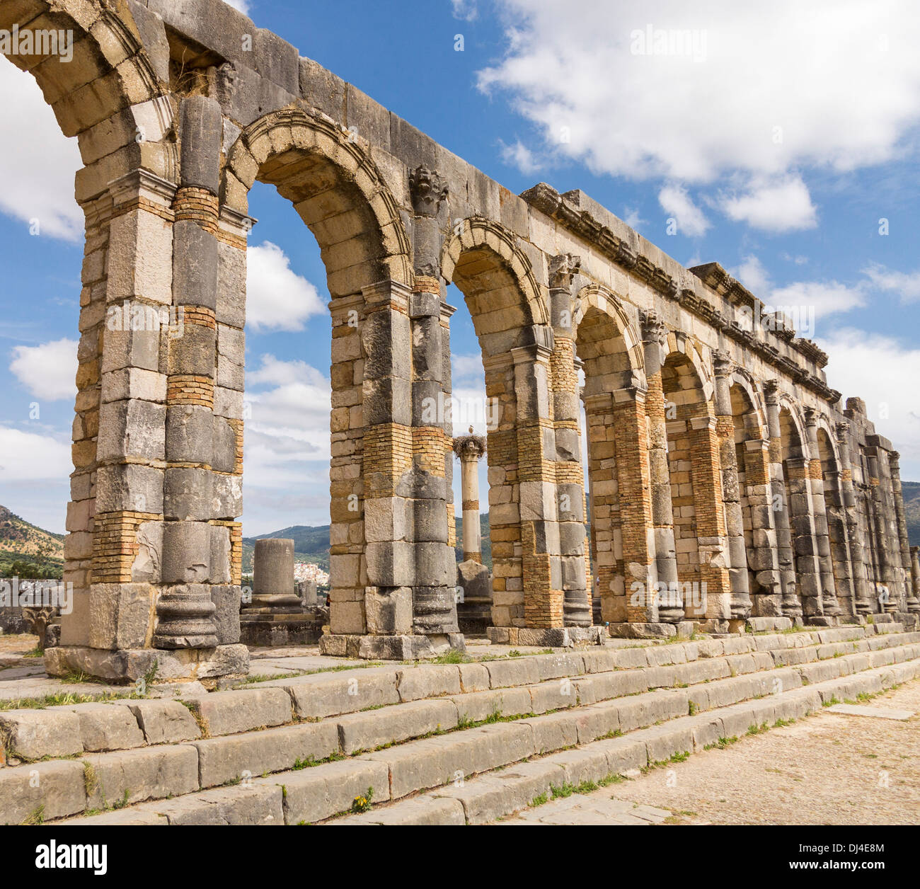 The ruined Basilica at Volubilis, an ancient Roman town near Meknes in Morocco Stock Photo