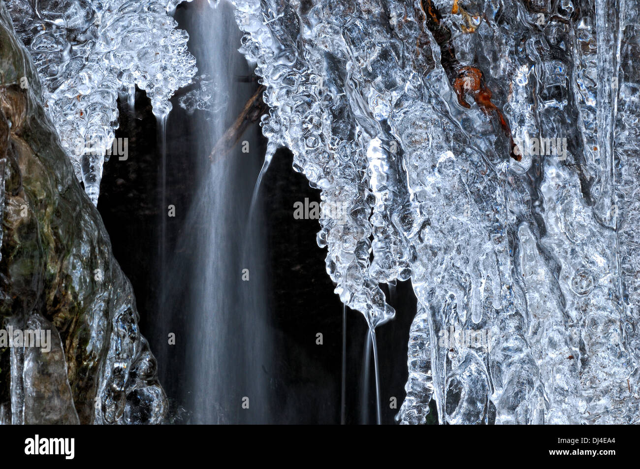 Small ice wall in front of the water Stock Photo