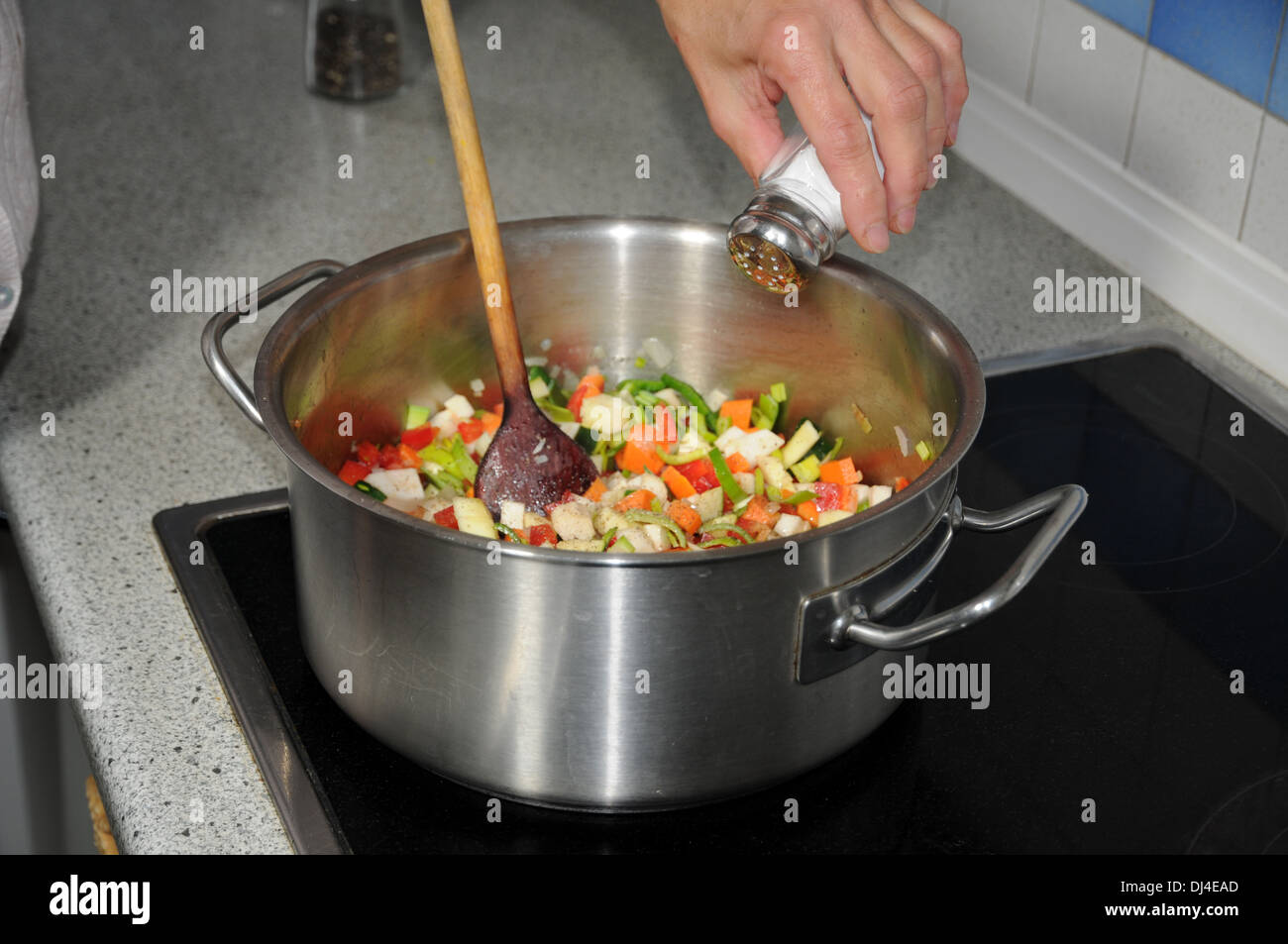Salting Vegetables Stock Photo