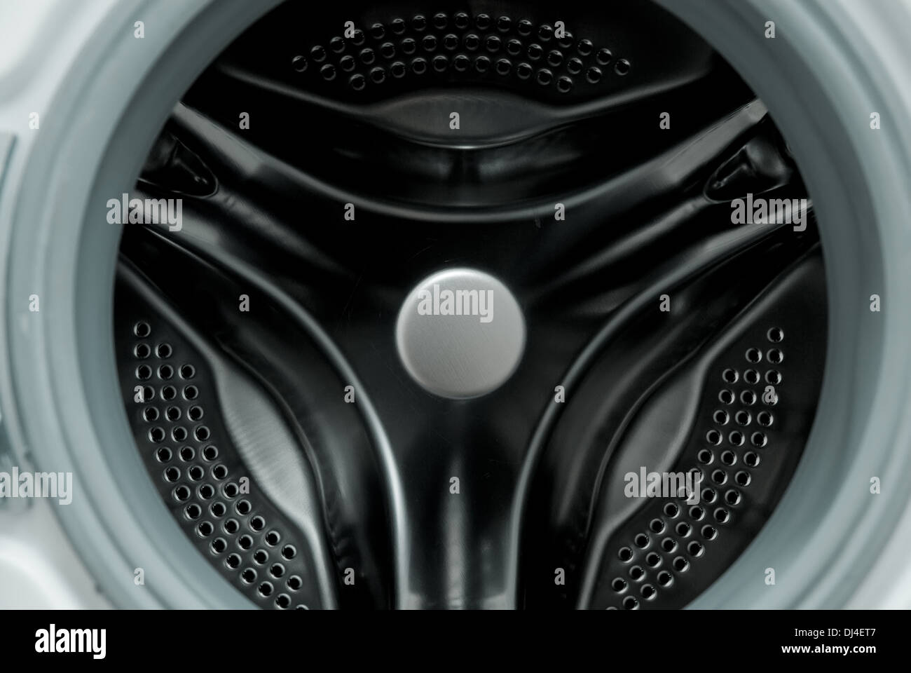 Interior of a drum washing machine Stock Photo