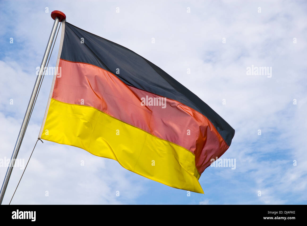 German flag blowing in the wind Stock Photo