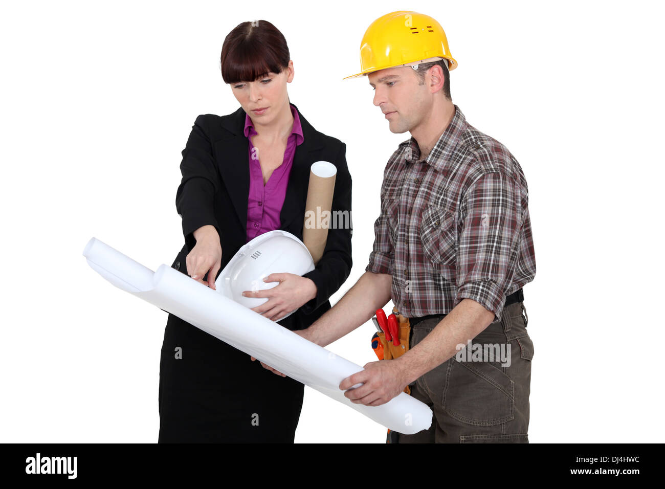 Tradesman consulting with an engineer Stock Photo