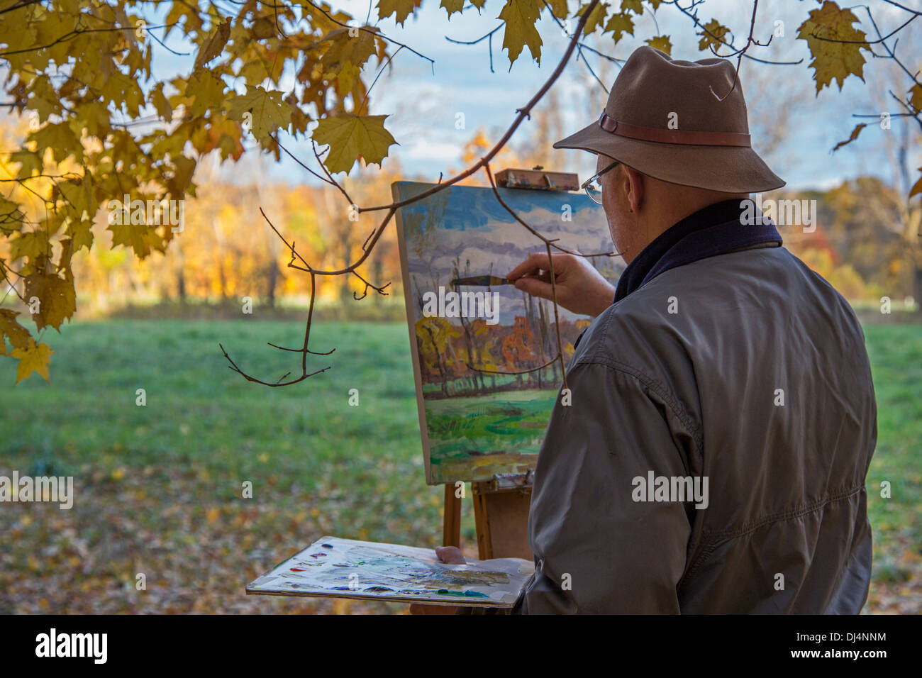 Porter, Indiana - An artist paints fall colors at Indiana Dunes National Lakeshore. Stock Photo
