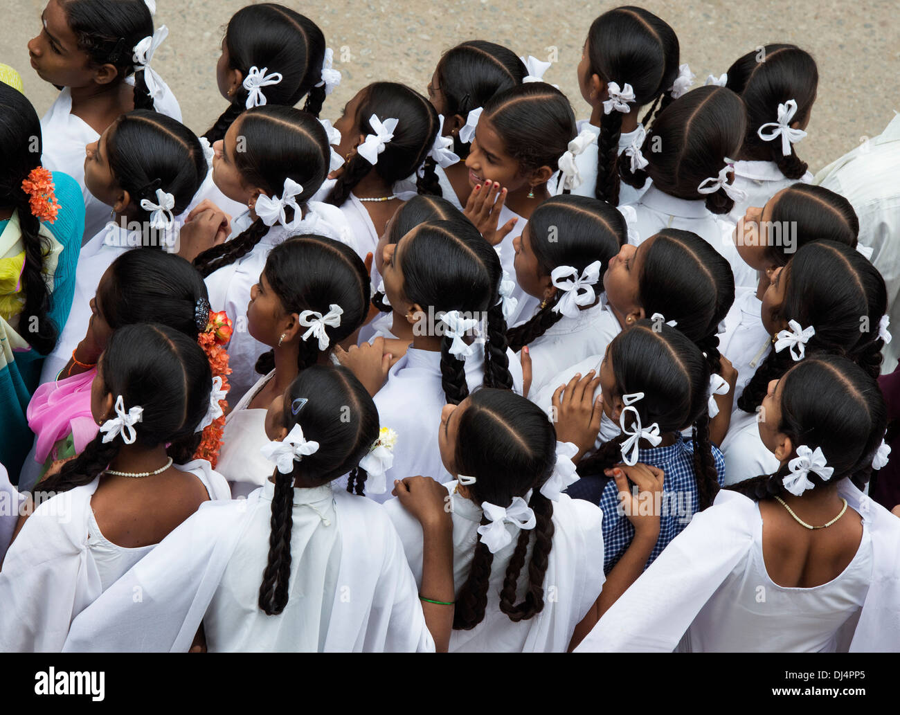 Group of Indian school girls watching a festival parade. Puttaparthi, Andhra Pradesh, India Stock Photo