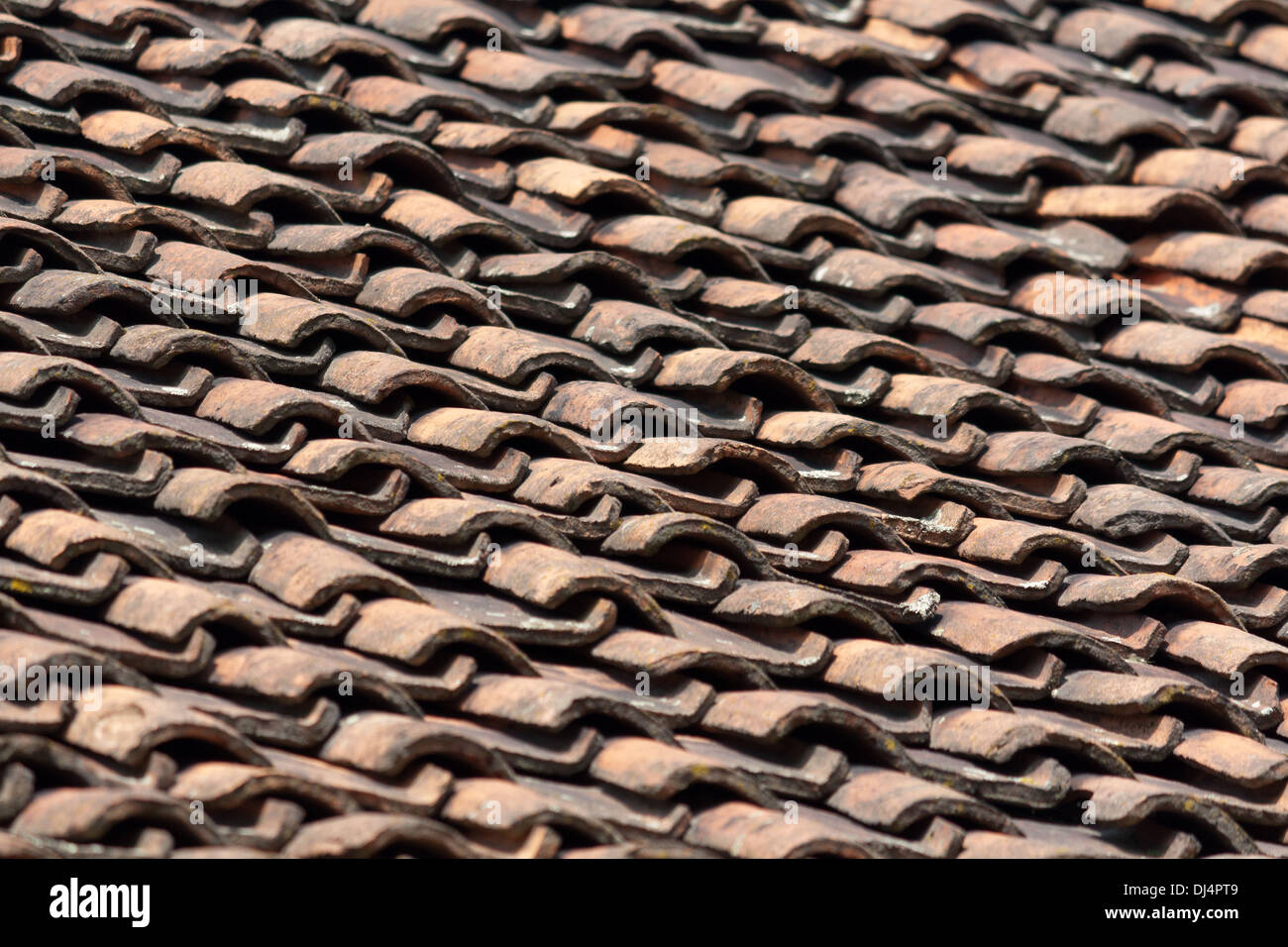 house with old red roof tiles blown Stock Photo