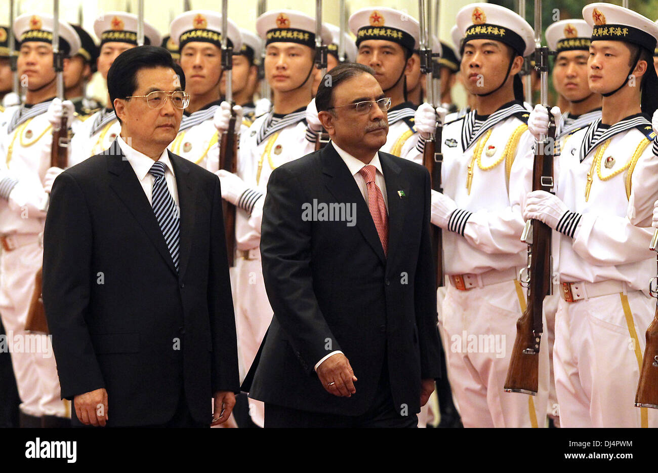 Beijing, CHINA, China. 7th June, 2012. Chinese President Hu Jintao escorts Pakistan President Asif Ali Zardari past his cabinet during a welcoming ceremony at the Great Hall of the People in Beijing on June 7, 2012. With the prospect of a decline in U.S. influence in Afghanistan over the next two years, China is reaching out to Afghanistan and Pakistan in a bid to improve economic and security ties. © Stephen Shaver/ZUMAPRESS.com/Alamy Live News Stock Photo