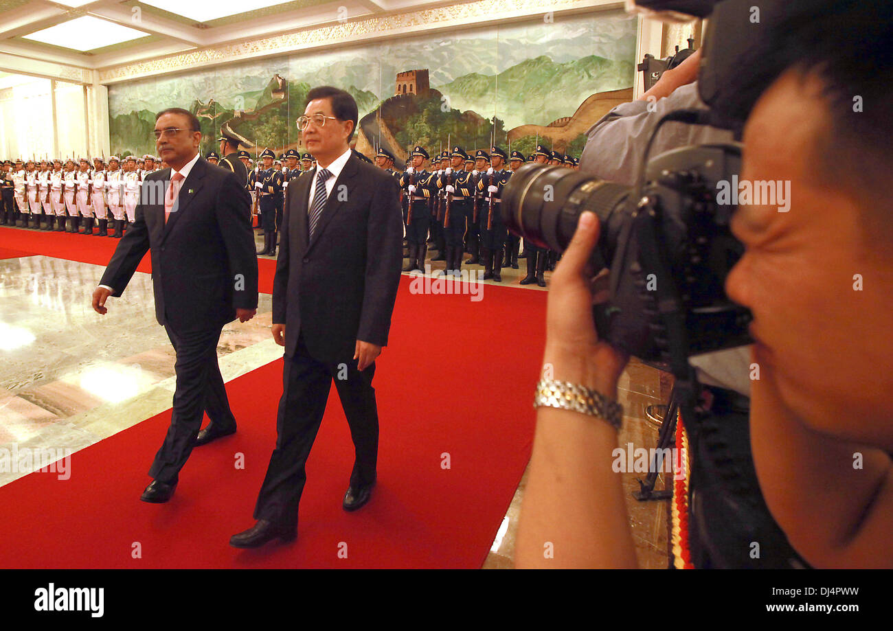 Beijing, CHINA, China. 7th June, 2012. Chinese President Hu Jintao escorts Pakistan President Asif Ali Zardari past his cabinet during a welcoming ceremony at the Great Hall of the People in Beijing on June 7, 2012. With the prospect of a decline in U.S. influence in Afghanistan over the next two years, China is reaching out to Afghanistan and Pakistan in a bid to improve economic and security ties. © Stephen Shaver/ZUMAPRESS.com/Alamy Live News Stock Photo