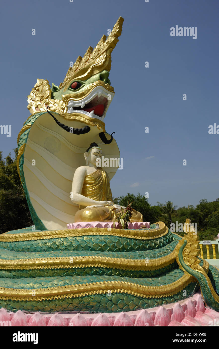 Naga snake with Buddha statue in Bago Stock Photo