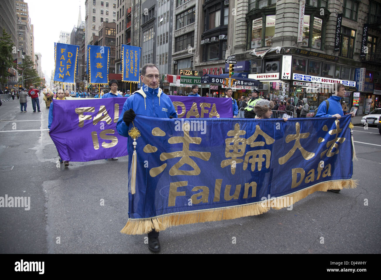 Falun Gong or Falun Dafa practitioners march in the Veterans Day Parade in New York city. Stock Photo