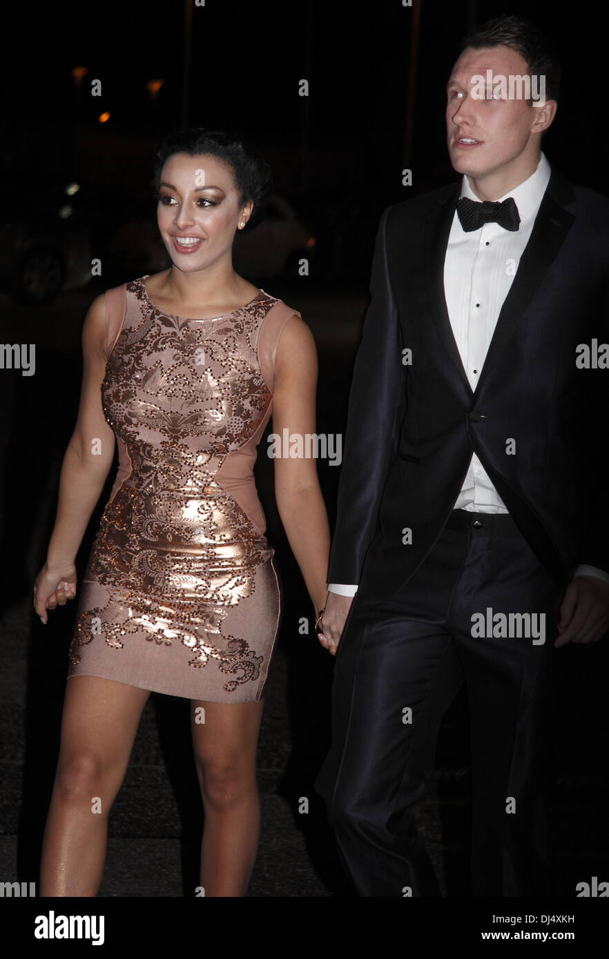 Old Trafford, Manchester, UK.  21 Nov 2013.  Phil Jones and Kaya Hall - Arrivals at the United for UNICEF Gala Dinner attended by the full Manchester United first-team and celebrities.  The dinner celebrated 14 years of the partnership between Manchester United and UNICEF, the worldÕs leading childrenÕs organisation, and raised over £200,000 for its work for vulnerable children around the world. Credit:  Deborah Vernon/Alamy Live News Stock Photo