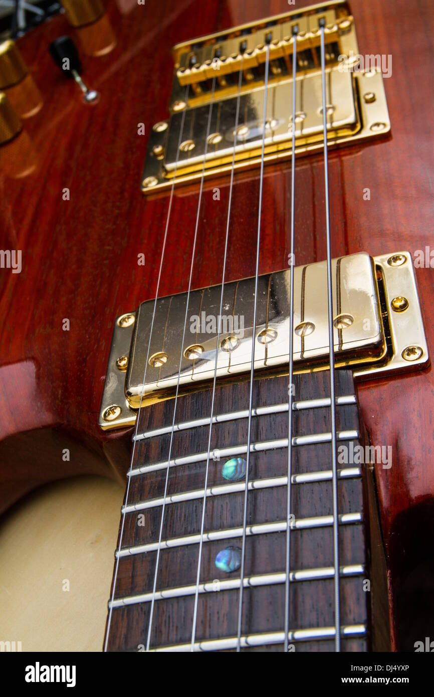 A custom electric guitar made from padouk Stock Photo Alamy