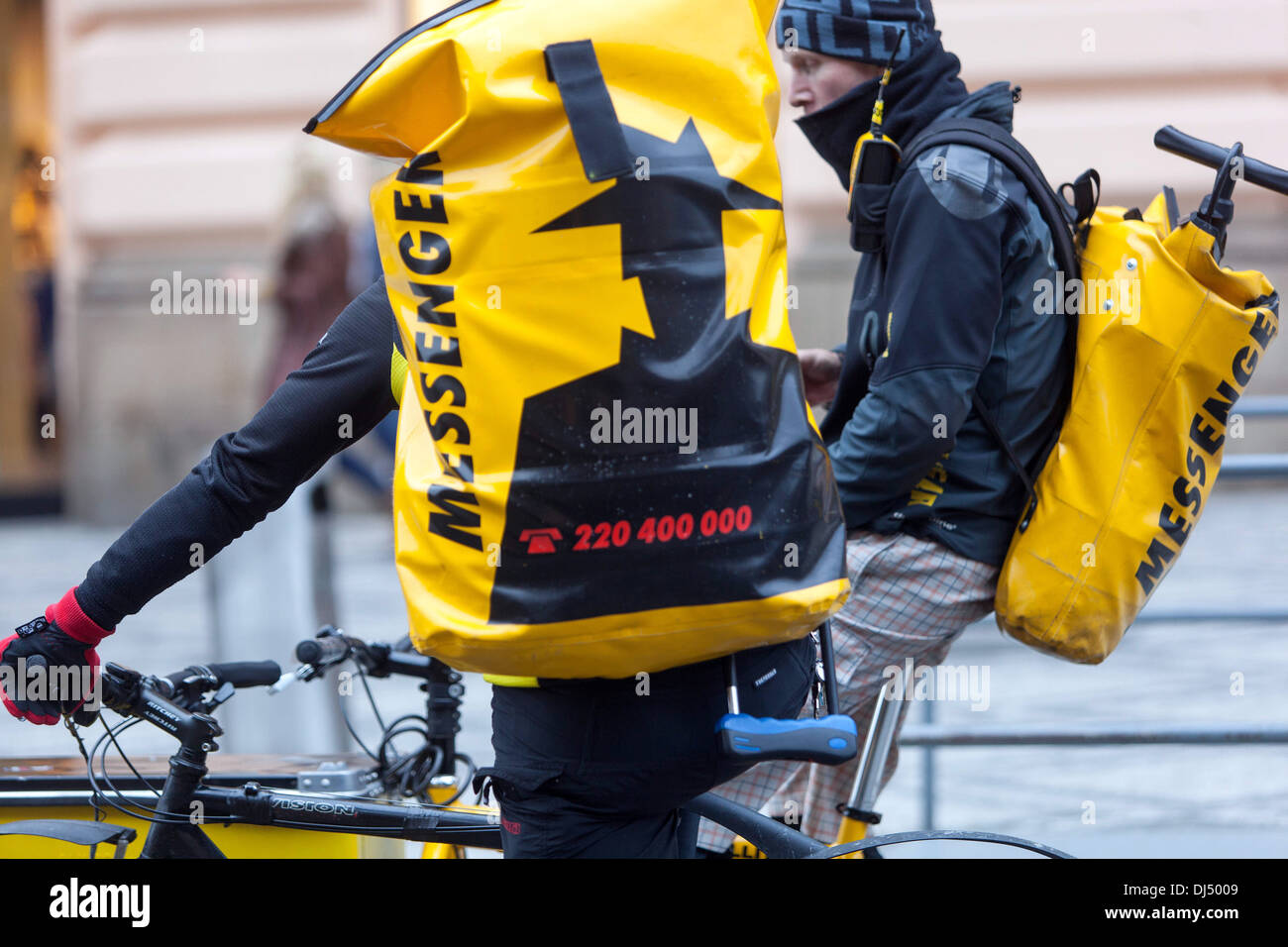 Biker, bike messenger, delivery service in the center of Prague, Czech Republic, Europe Stock Photo