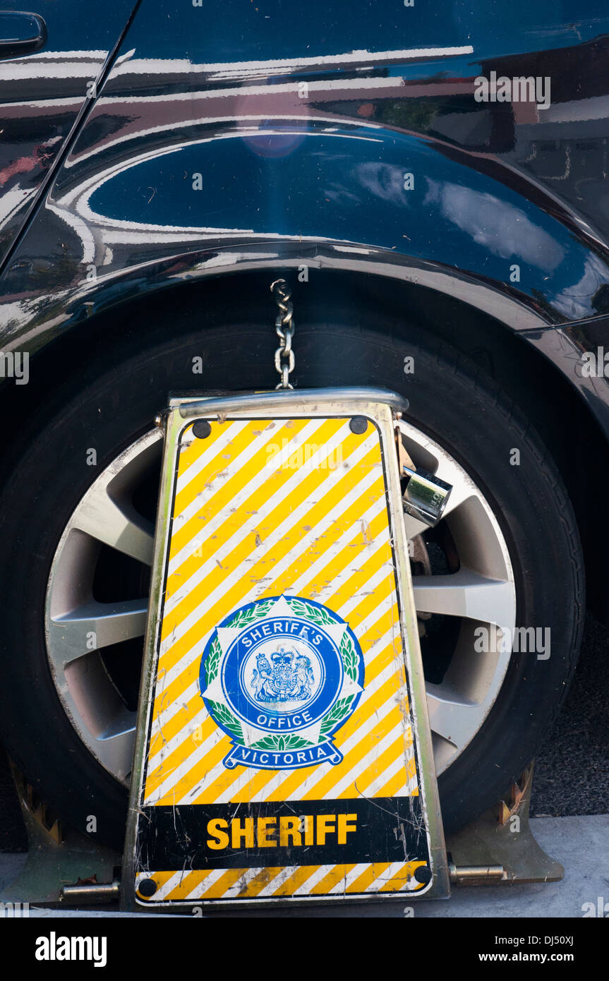 Wheelclamped vehicle immobilised by the state Sheriff's office