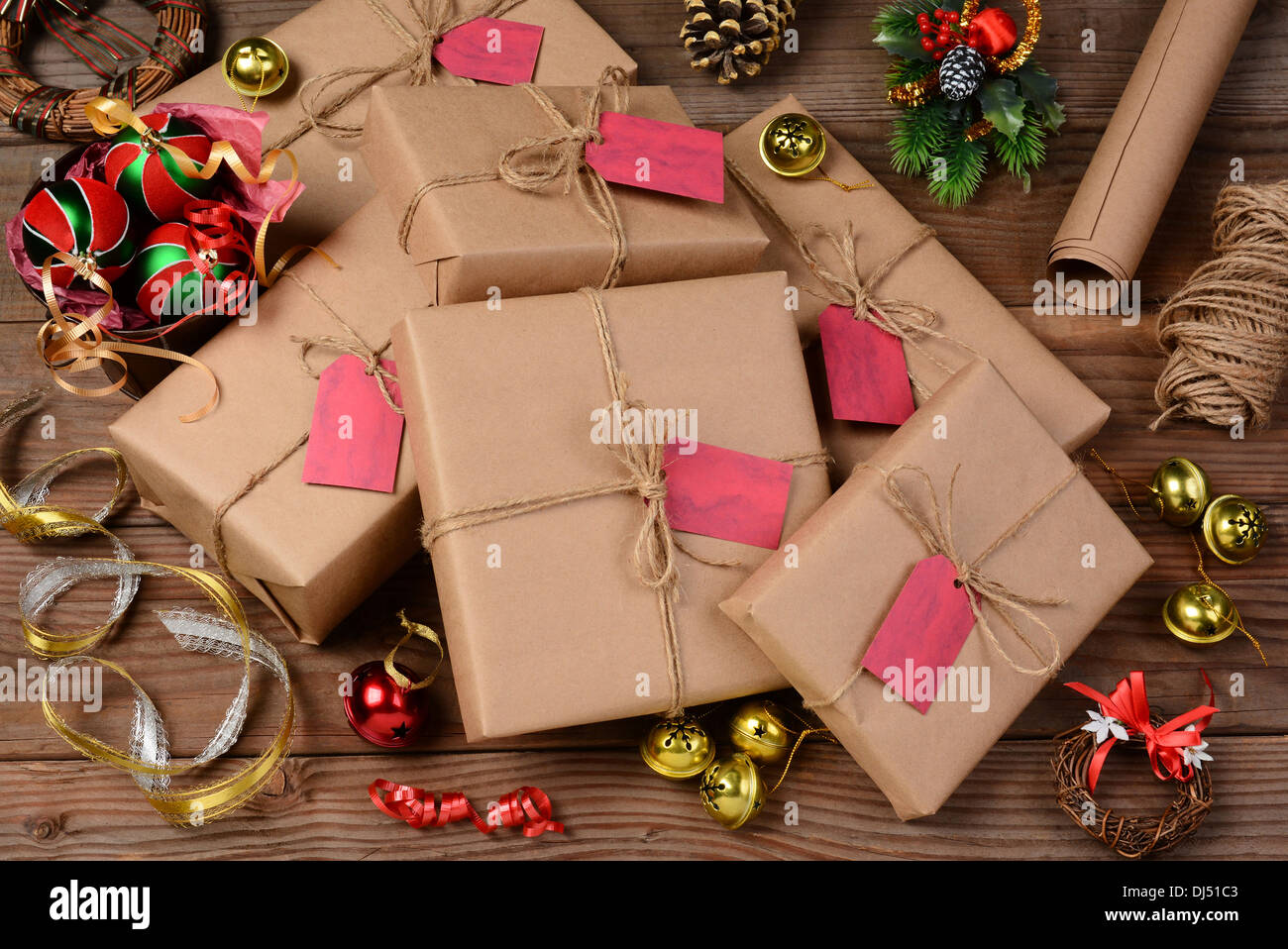 Christmas still life with eco friendly wrapping paper and supplies. Horizontal format shot from a high angle. Stock Photo