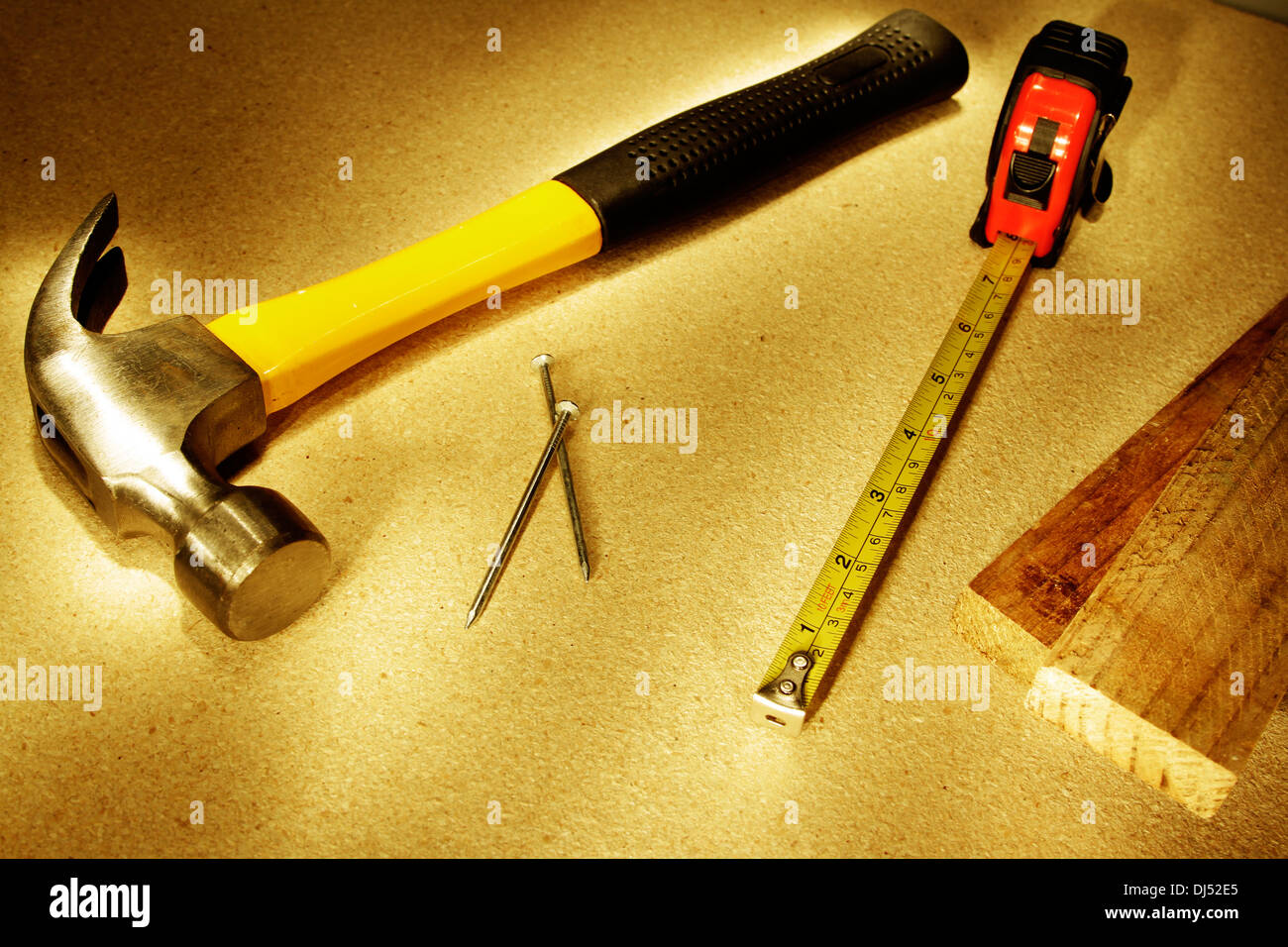 Hammer nails and tape measure Stock Photo Alamy